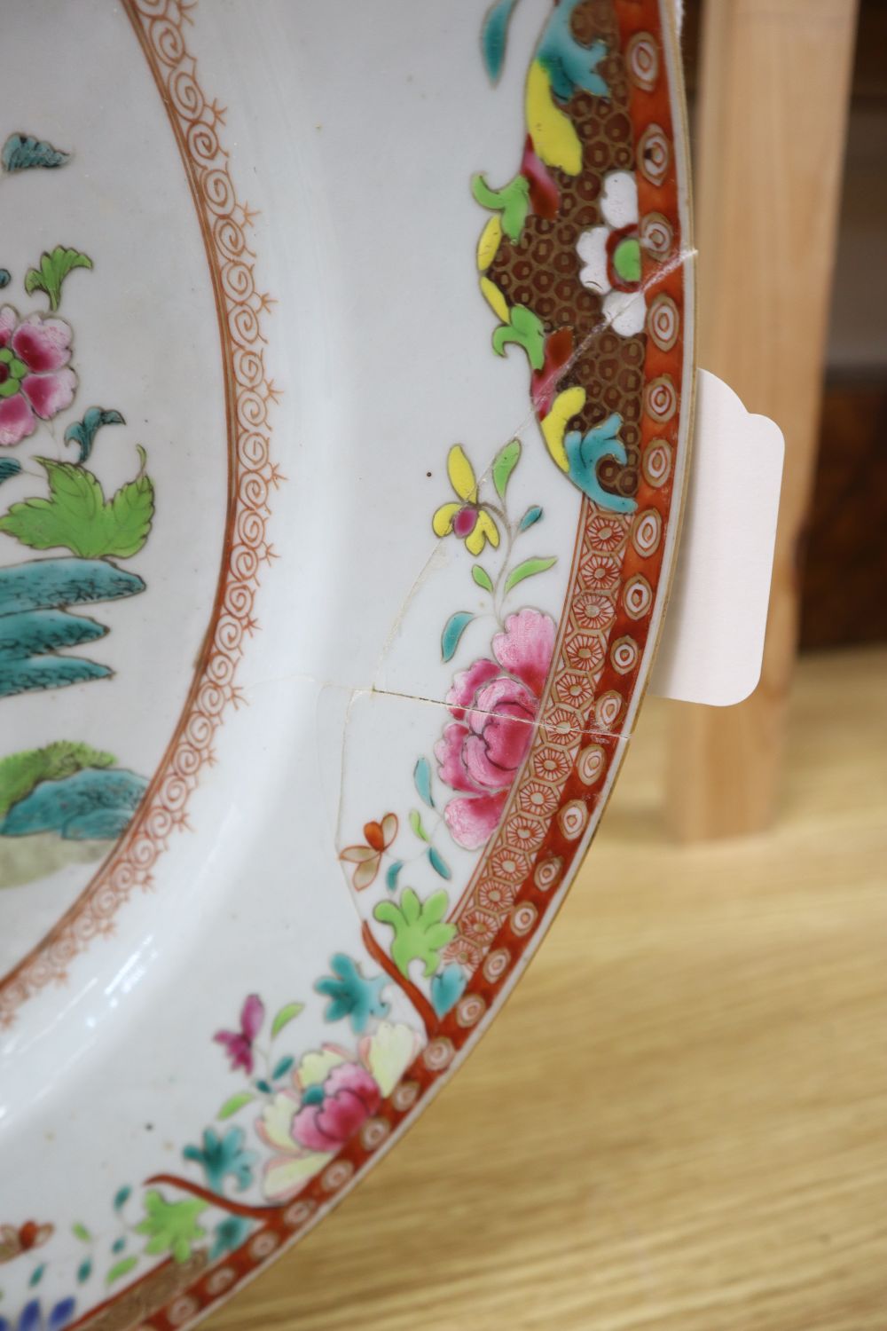 A Chinese double peacock famille rose charger, 18th century, diameter 41cm